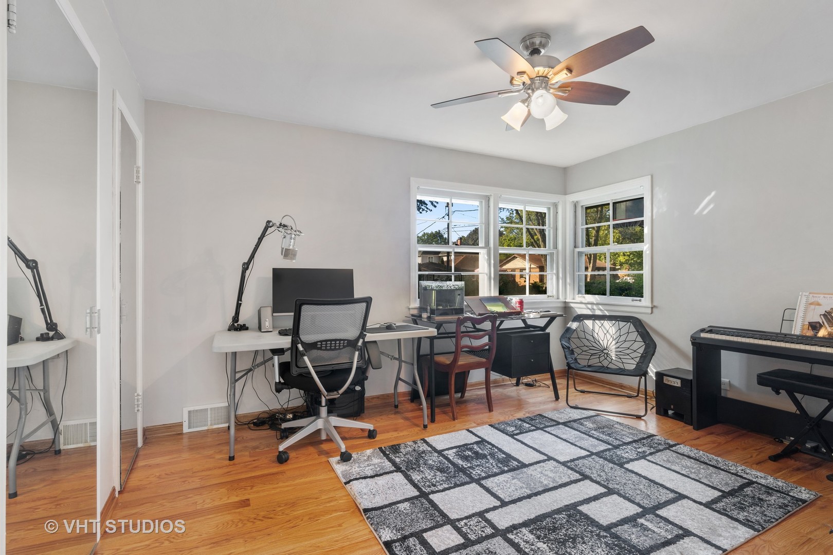 1600 Good Avenue Park Ridge, IL 60068 - Photo 9 of 20 a living room with furniture a rug and a window