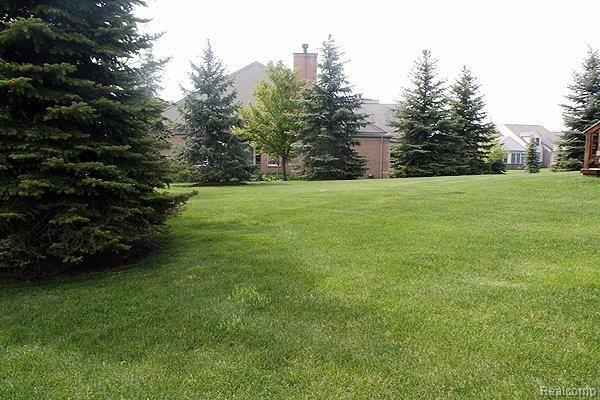 844 Garnet Court, Unit 39 Rochester, MI 48306 - Photo 23 of 25 Lot with mature trees