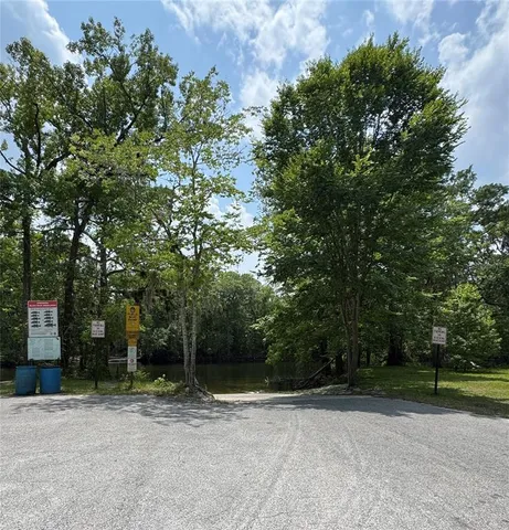 front view of a house with a tree