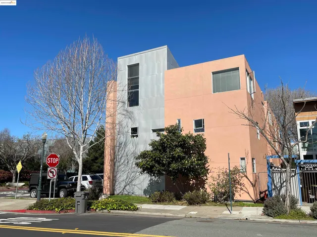 a front view of a building with street view