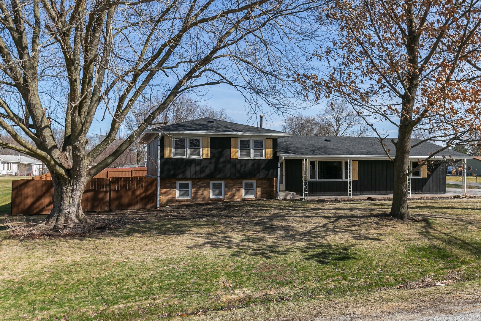 11622 27th Street West Milan, IL 61264 - Photo 2 of 49 a front view of a house with a yard