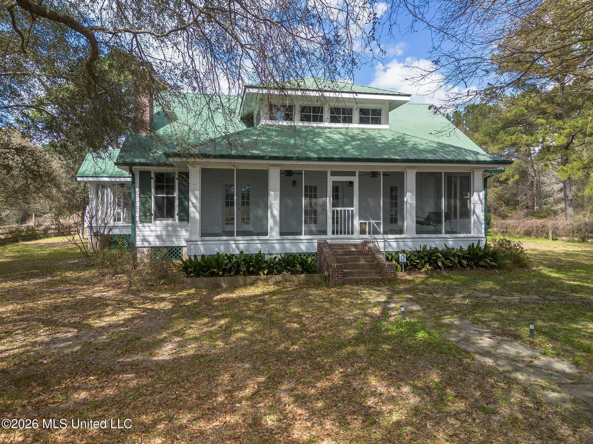 23676 East Dubuisson Road Pass Christian, MS 39571 - Photo 1 of 65 main house front