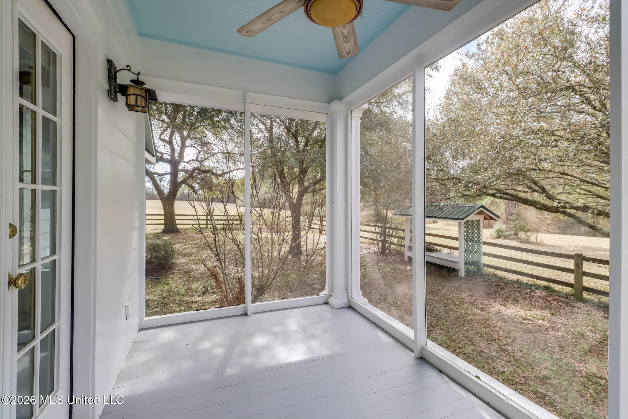 23676 East Dubuisson Road Pass Christian, MS 39571 - Photo 17 of 65 main house primary bedroom screened porc