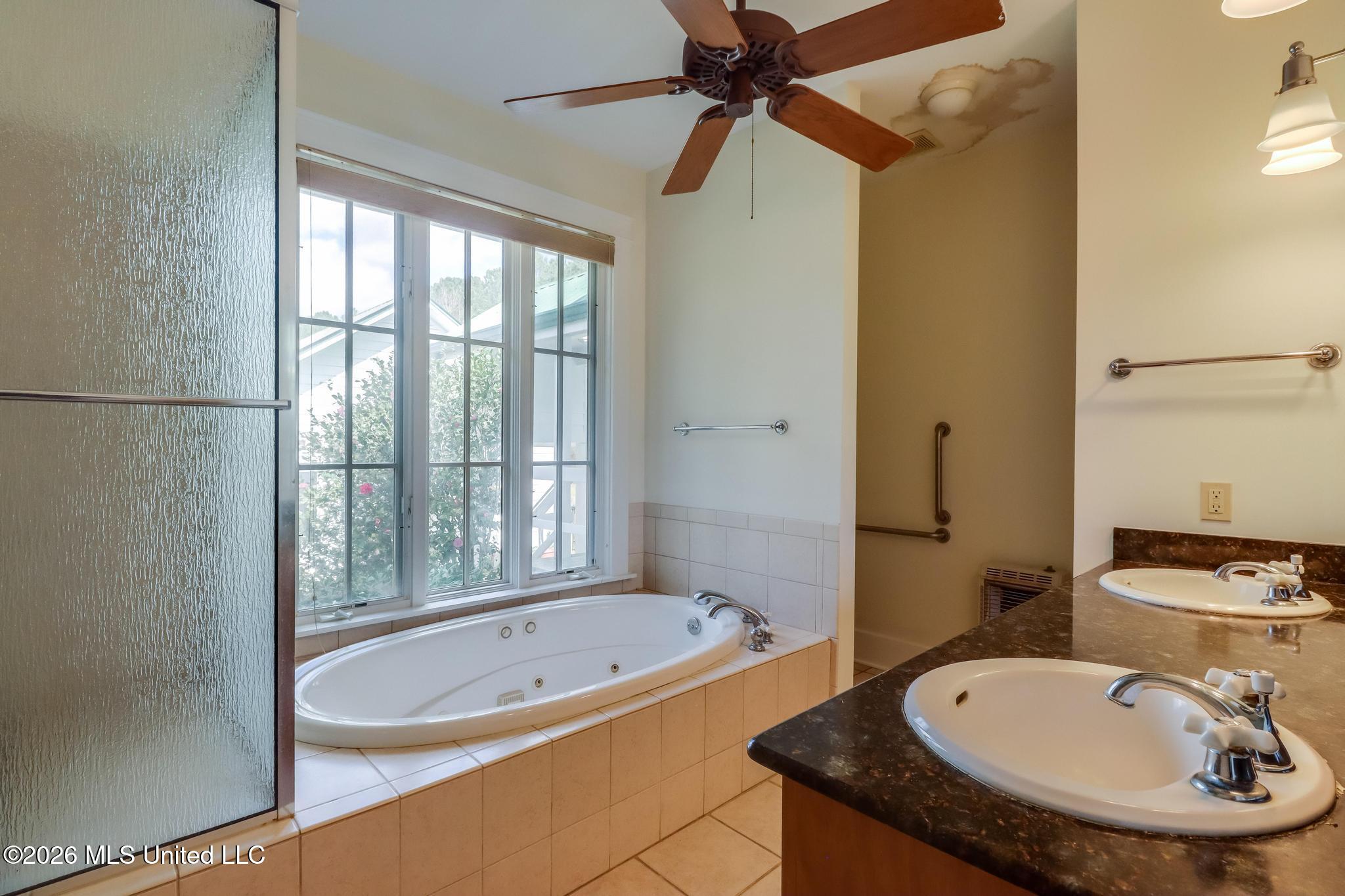 23676 East Dubuisson Road Pass Christian, MS 39571 - Photo 21 of 65 main house primary bath