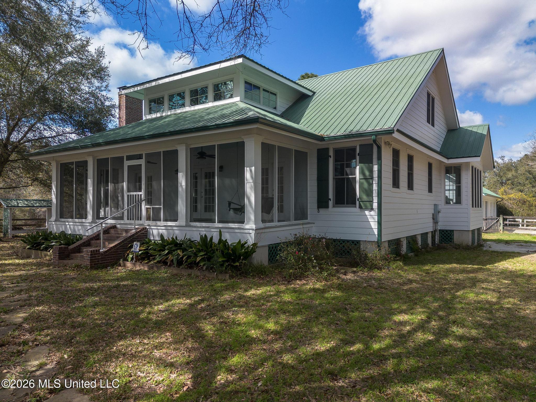 23676 East Dubuisson Road Pass Christian, MS 39571 - Photo 3 of 65 main house front 3
