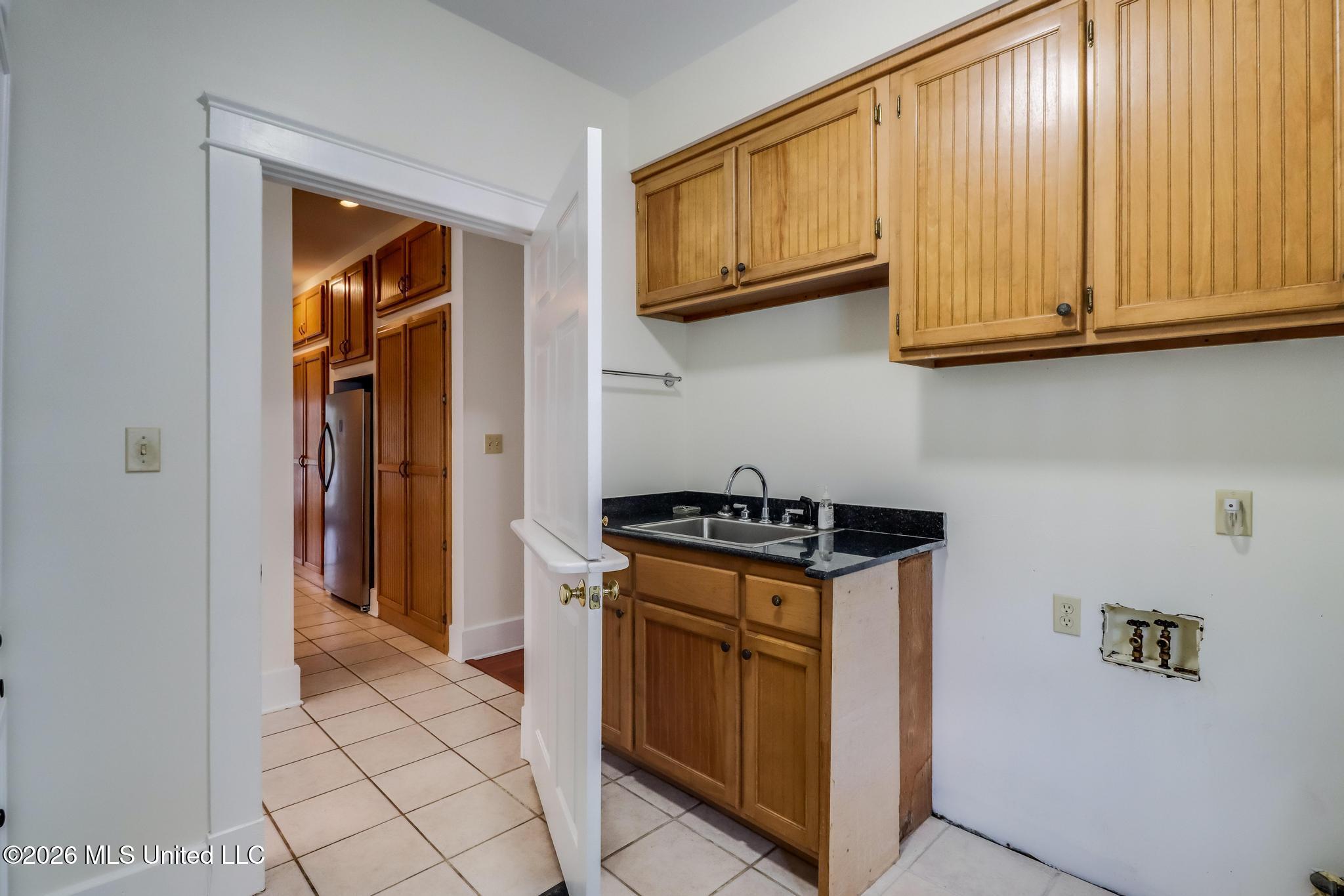 23676 East Dubuisson Road Pass Christian, MS 39571 - Photo 28 of 65 main house laundry