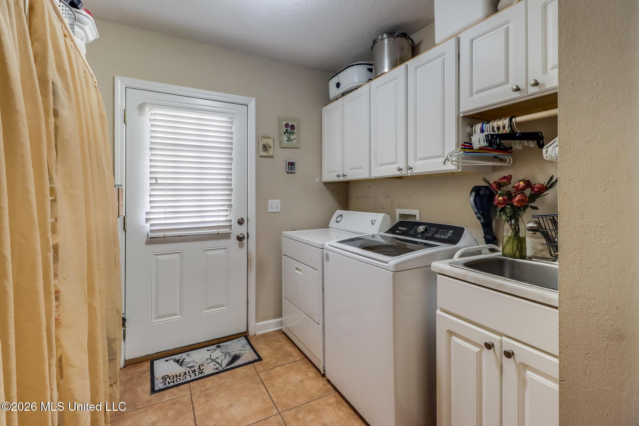 23676 East Dubuisson Road Pass Christian, MS 39571 - Photo 46 of 65 rental house laundry
