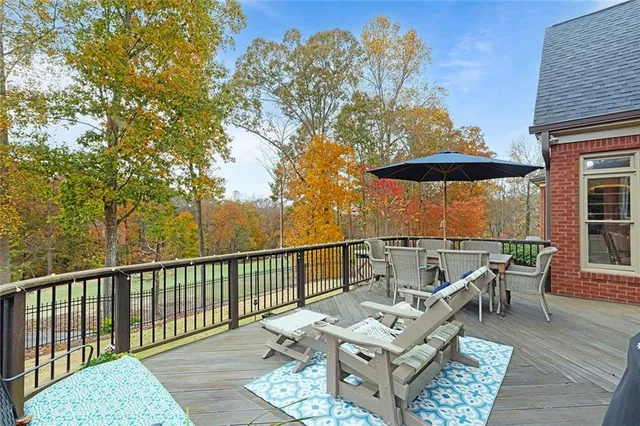 a spacious bathroom with a double vanity sink mirror and a bathtub