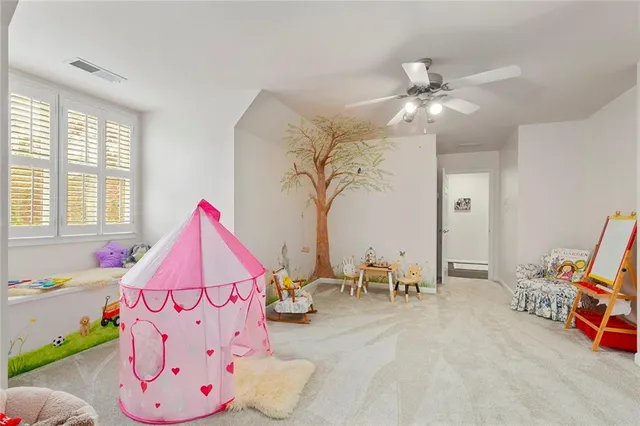 a view of a tables and chairs on the deck