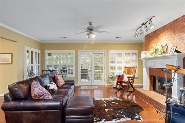 an aerial view of residential houses with outdoor space