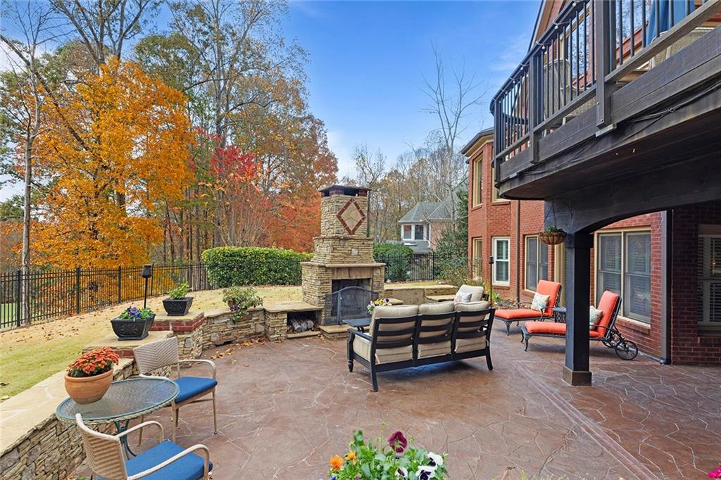 219 Morning Mist Way Woodstock, GA 30189 - Photo 57 of 72 a building outdoor space with patio furniture and potted plants