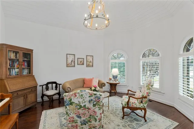 a view of a dining room with furniture and window