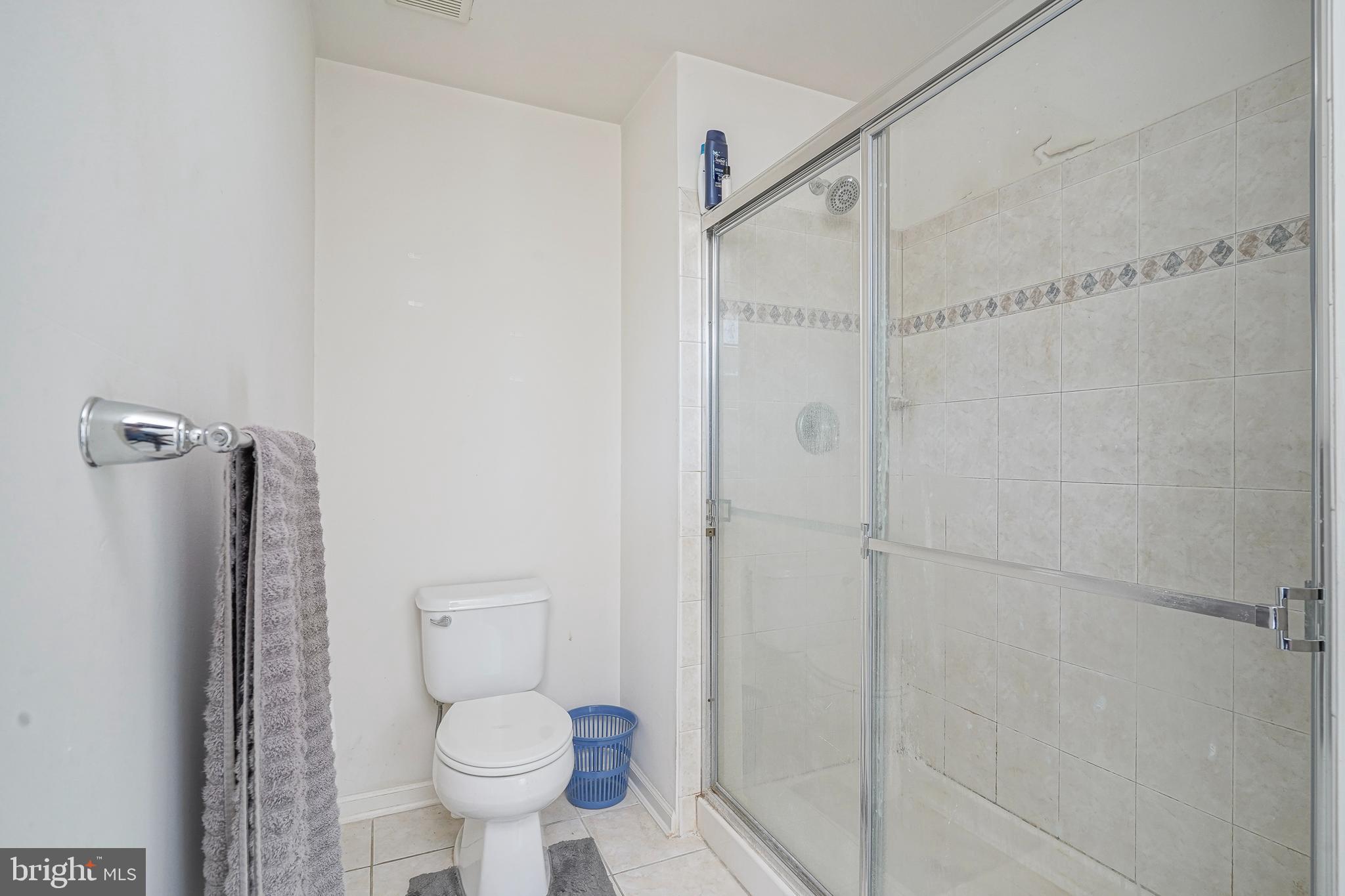 7 Fox Court Riverside, NJ 08075 - Photo 15 of 21 a bathroom with a toilet and a shower
