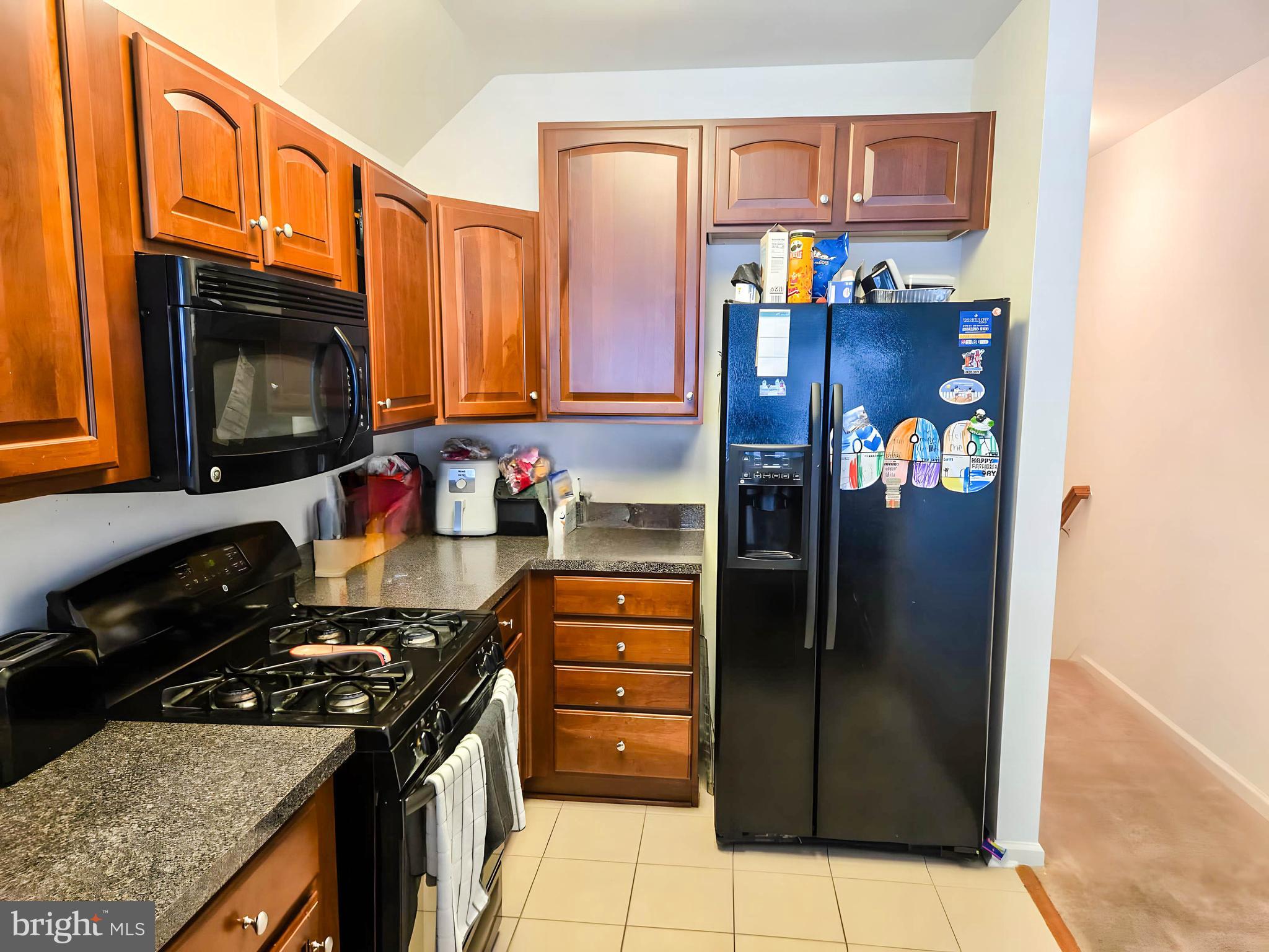 7 Fox Court Riverside, NJ 08075 - Photo 6 of 21 a kitchen with stainless steel appliances granite countertop a refrigerator and a stove top oven