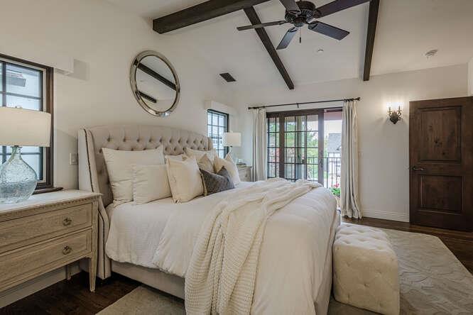 236 Amherst Avenue San Mateo, CA 94402 - Photo 14 of 35 a spacious bedroom with a bed and a large window