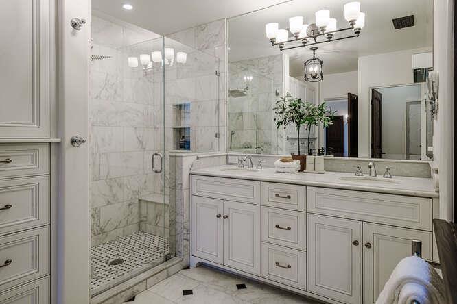 236 Amherst Avenue San Mateo, CA 94402 - Photo 17 of 35 a bathroom with a granite countertop sink a mirror and a shower