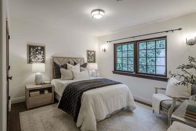 236 Amherst Avenue San Mateo, CA 94402 - Photo 25 of 35 a bedroom with a bed and a large window