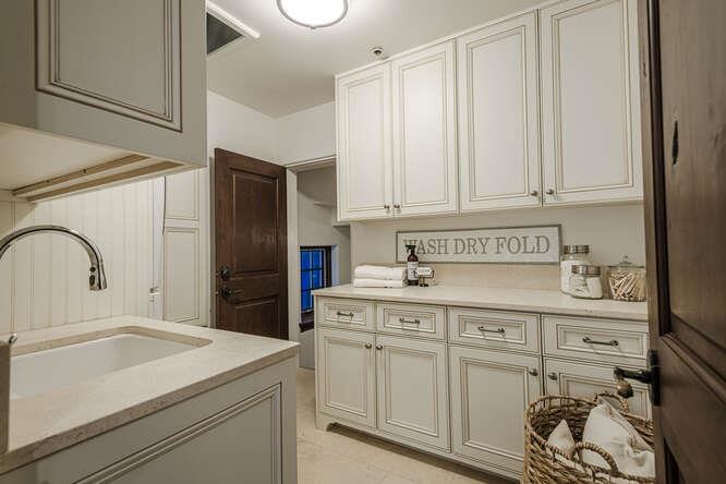 236 Amherst Avenue San Mateo, CA 94402 - Photo 28 of 35 a kitchen with white cabinets and sink