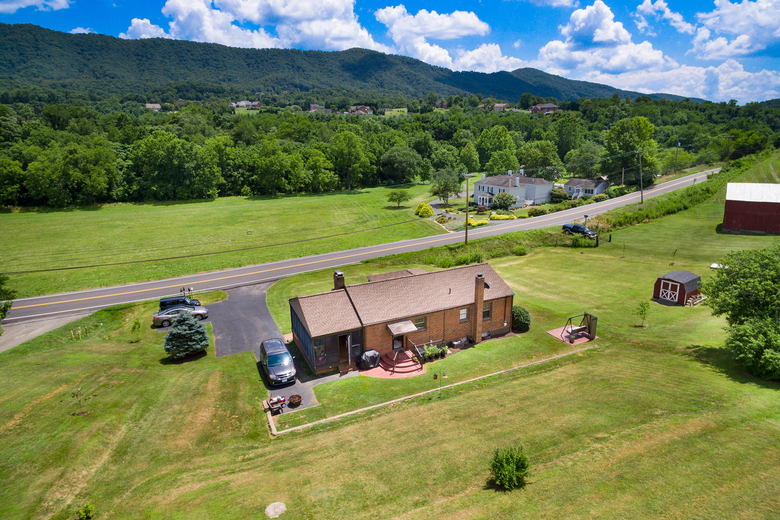 1139 Webster Road Roanoke, VA 24012 - Photo 22 of 27 a view of a golf course with a swimming pool