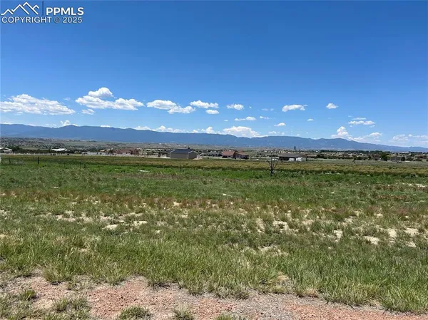 a view of a lake with a big yard