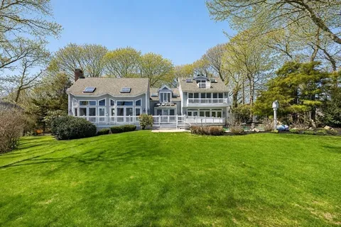 a view of a house with a big yard