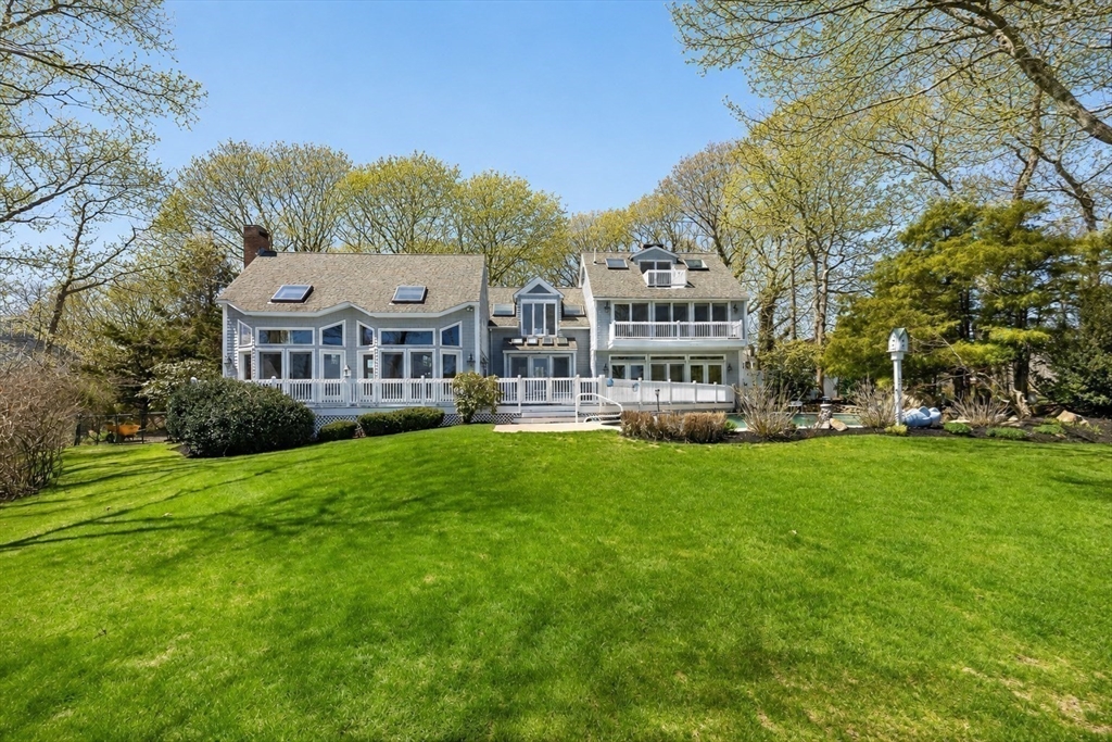 19 Ellisville Road Plymouth, MA 02360 - Photo 10 of 11 a view of a house with a big yard