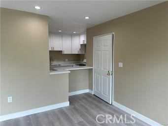 219 East Maple Street, Unit 9 Glendale, CA 91205 - Photo 11 of 13 a view of kitchen with wooden floor