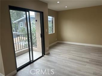 219 East Maple Street, Unit 9 Glendale, CA 91205 - Photo 3 of 13 a view of an empty room with glass door