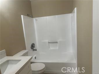 219 East Maple Street, Unit 9 Glendale, CA 91205 - Photo 6 of 13 a white toilet sitting next to a bath tub