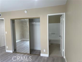 219 East Maple Street, Unit 9 Glendale, CA 91205 - Photo 7 of 13 an empty room with wooden door