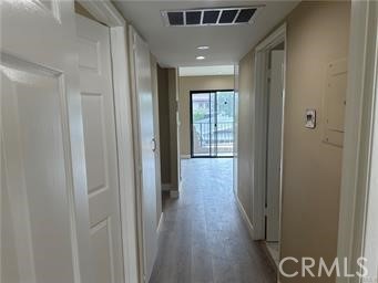 219 East Maple Street, Unit 9 Glendale, CA 91205 - Photo 8 of 13 a view of hallway with wooden floor