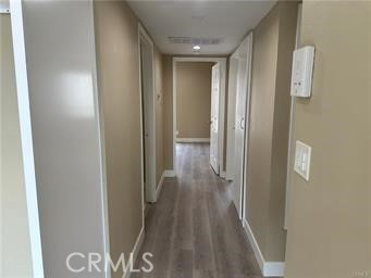 219 East Maple Street, Unit 9 Glendale, CA 91205 - Photo 10 of 13 a view of a hallway with wooden floor