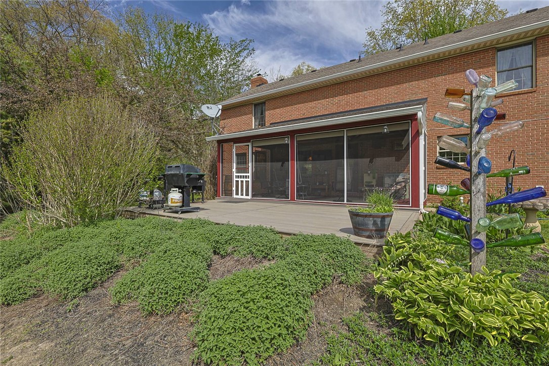 1757 Phillips Road Lebanon, OH 45036 - Photo 29 of 51 This spacious deck offers seamless indoor-outdoor living, perfect for entertaining amidst lush landscaping.