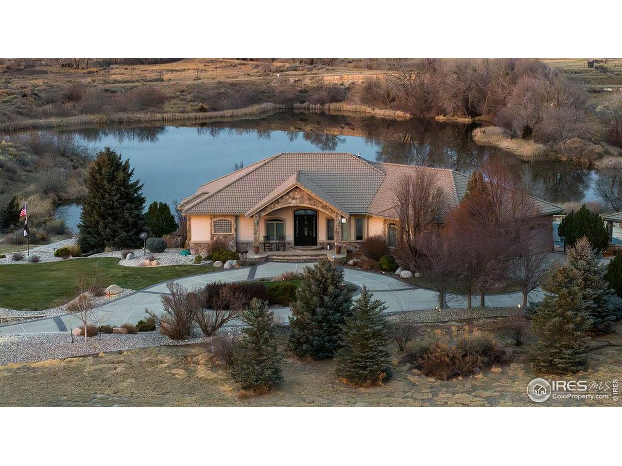 46 Sunset Lane Fort Morgan, CO 80701 - Photo 1 of 49 a aerial view of a house with a yard