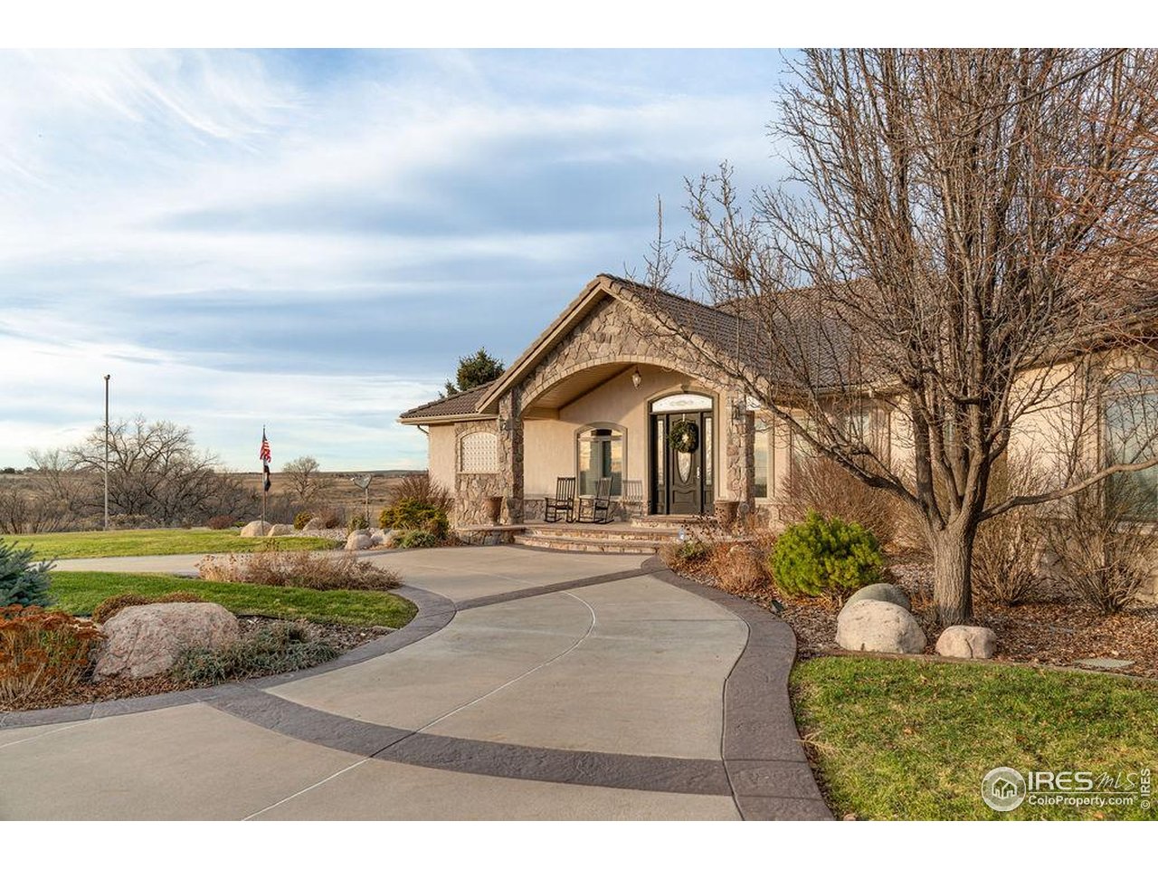 46 Sunset Lane Fort Morgan, CO 80701 - Photo 11 of 49 a view of a yard in front of the house