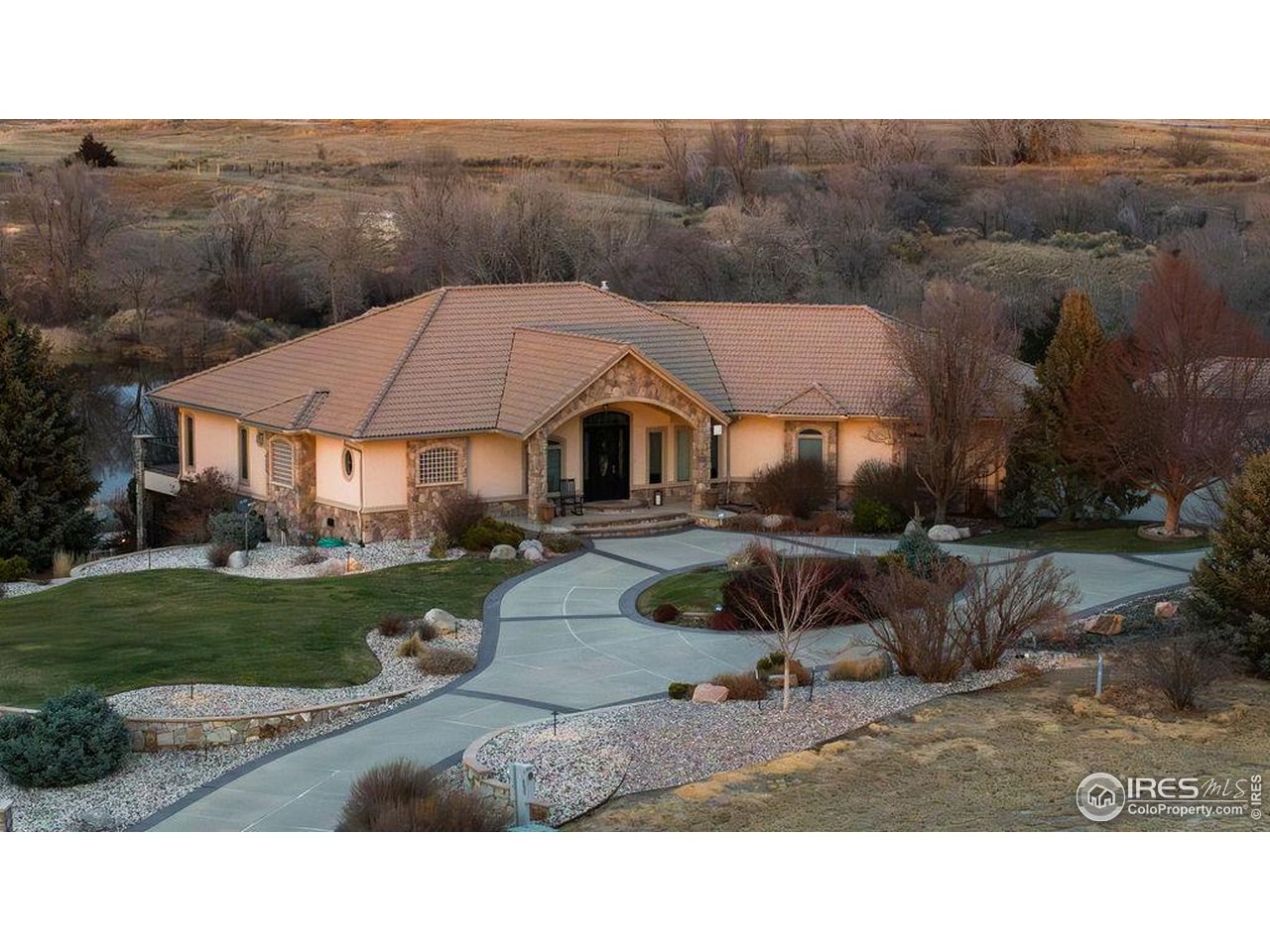 46 Sunset Lane Fort Morgan, CO 80701 - Photo 4 of 49 a aerial view of a house with a garden