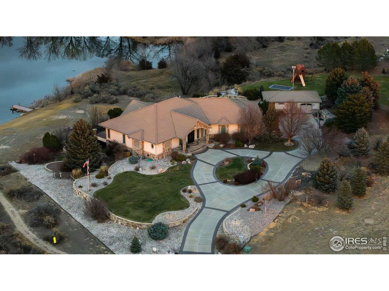 46 Sunset Lane Fort Morgan, CO 80701 - Photo 9 of 49 a aerial view of a house with a garden