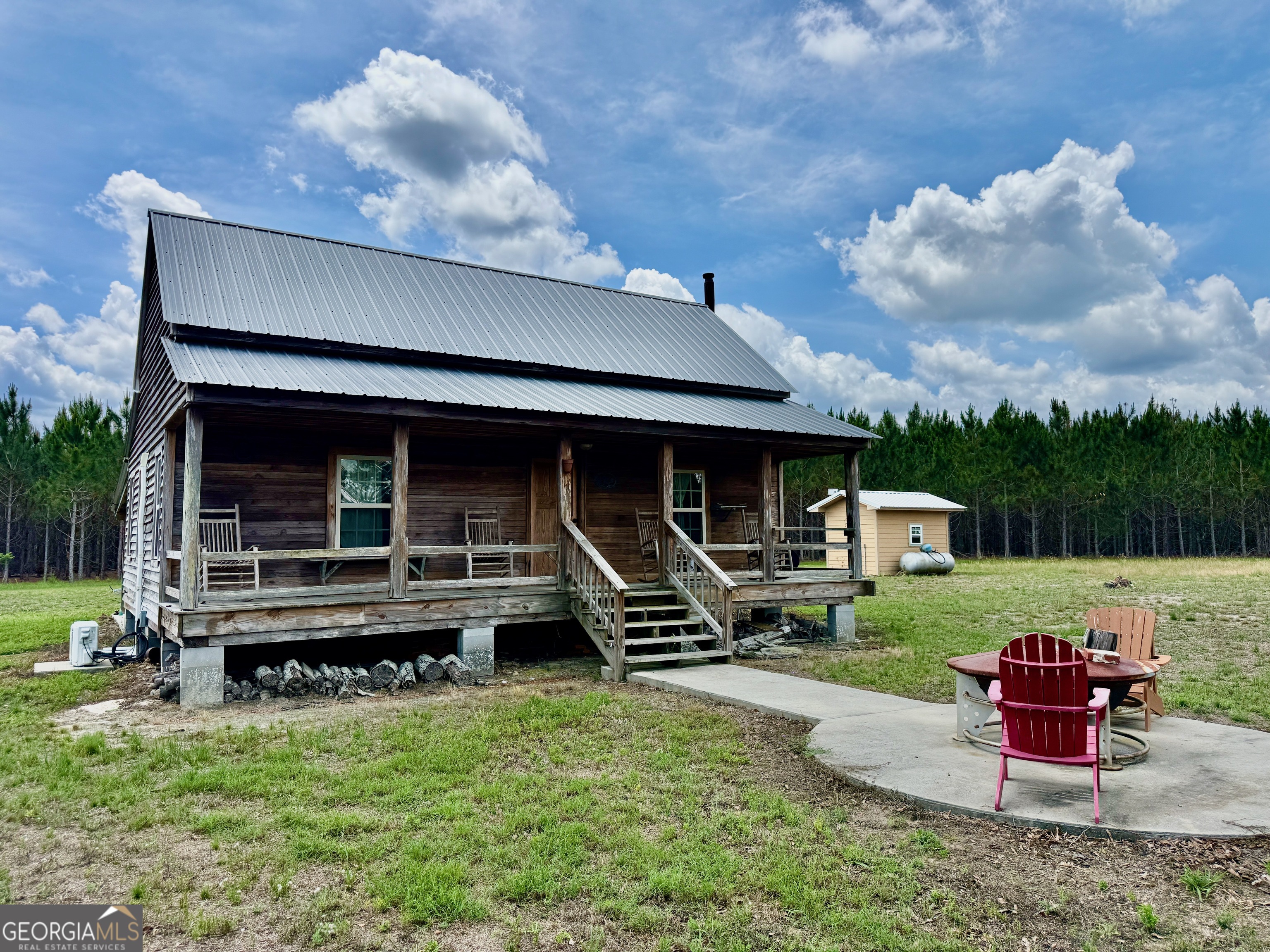 0 Neily Wagon Road McRae-Helena, GA 31055 - Photo 4 of 27 a view of a house with backyard sitting area and garden