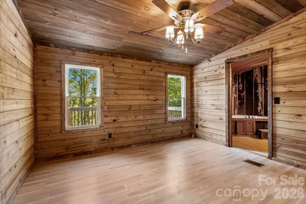 an empty room with windows