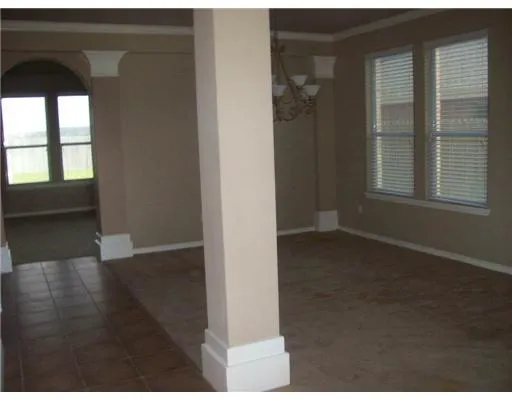 a view of a room that has a window in it