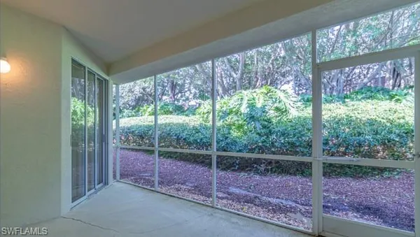 a view of a room with windows