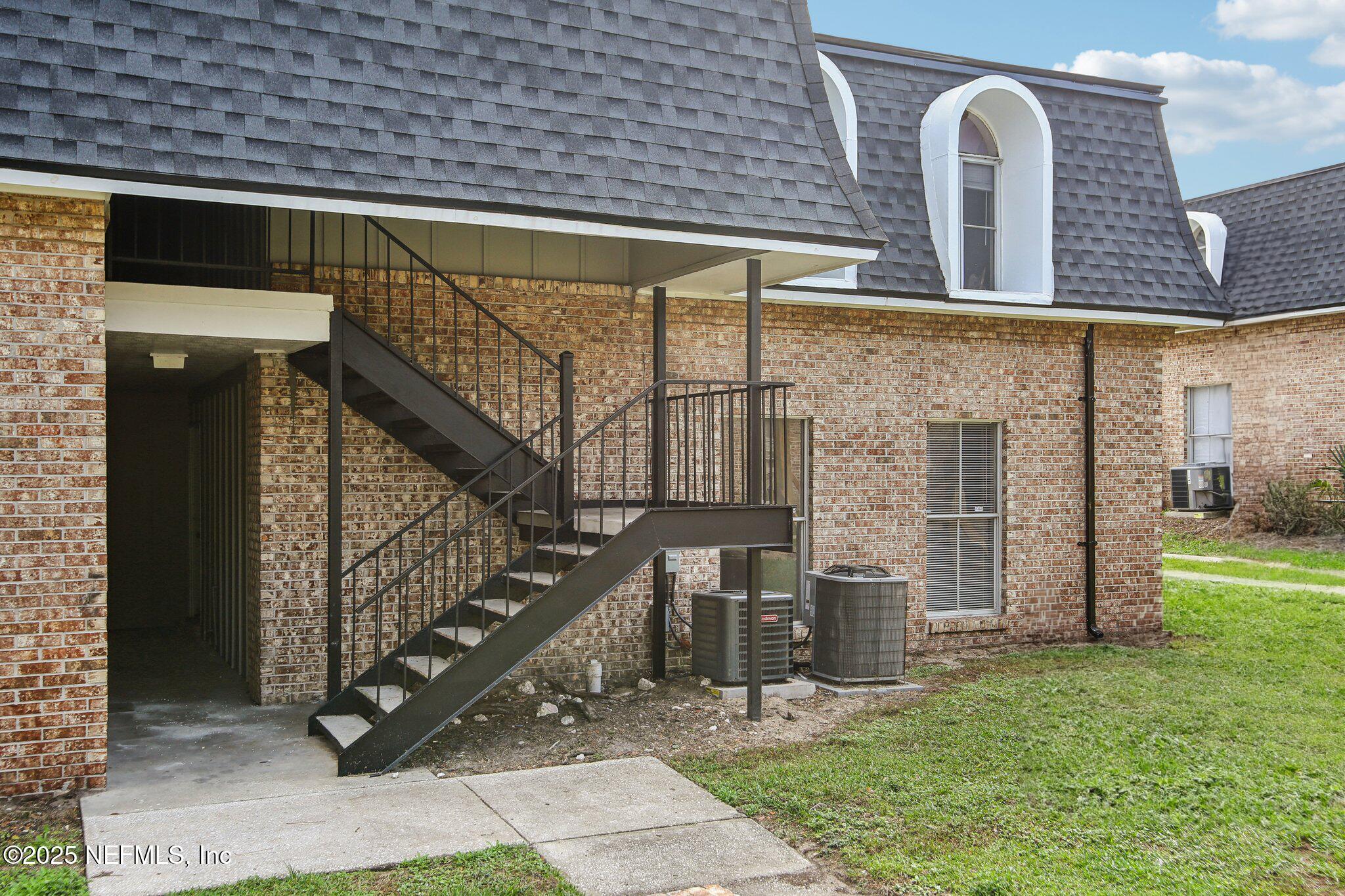 851 Bert Road, Unit 11 Jacksonville, FL 32211 - Photo 21 of 24 a view of a door with a sink