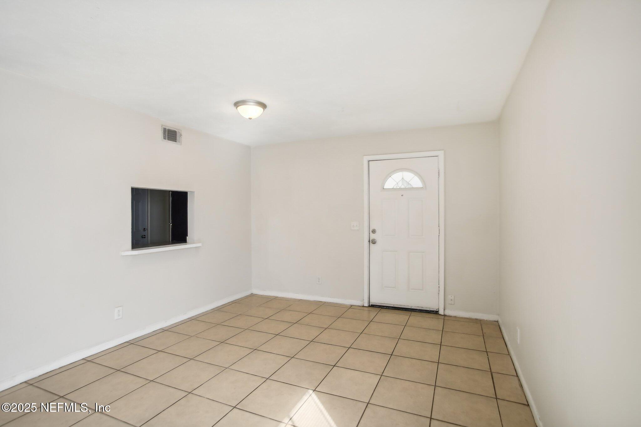 851 Bert Road, Unit 11 Jacksonville, FL 32211 - Photo 7 of 24 a view of an empty room
