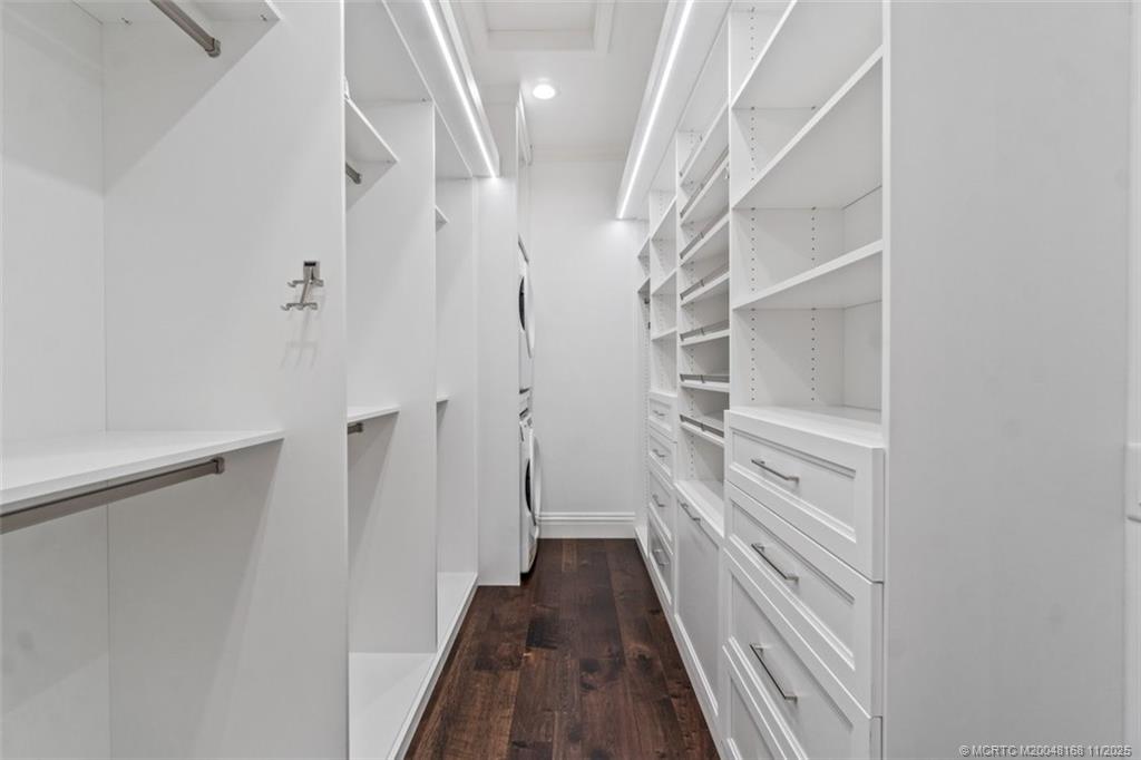 1904 Southeast Sailfish Point Boulevard Stuart, FL 34996 - Photo 27 of 64 a view of a hallway with staircase