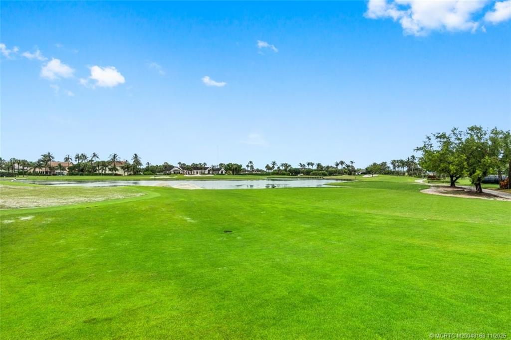 1904 Southeast Sailfish Point Boulevard Stuart, FL 34996 - Photo 63 of 64 a view of an ocean and a yard