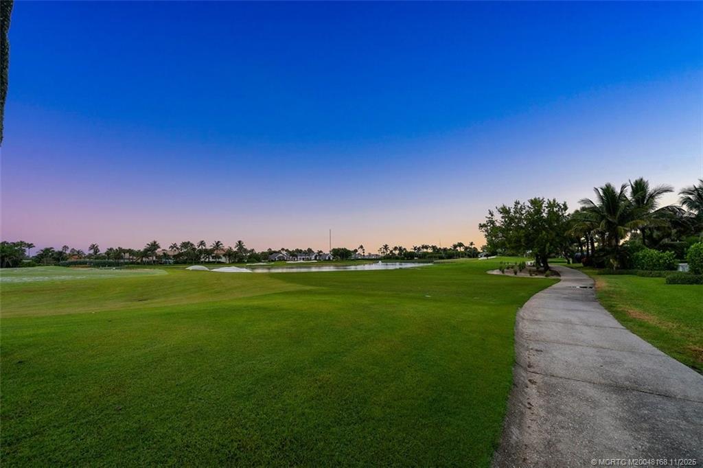 1904 Southeast Sailfish Point Boulevard Stuart, FL 34996 - Photo 64 of 64 a view of a golf course with a lake