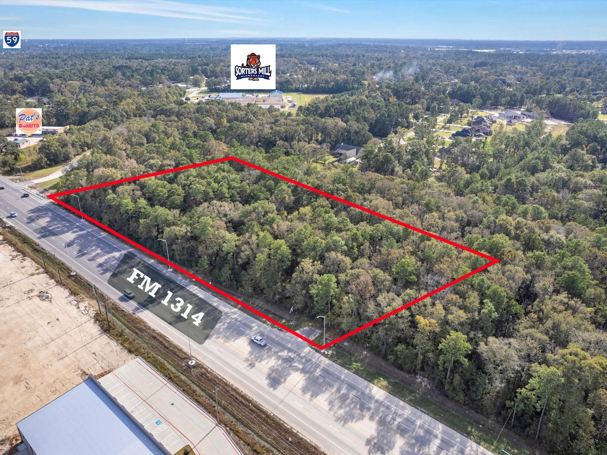 1314 Rd Porter Tx 77365 Road Porter, TX 77365 - Photo 2 of 7 a view of a lush green field