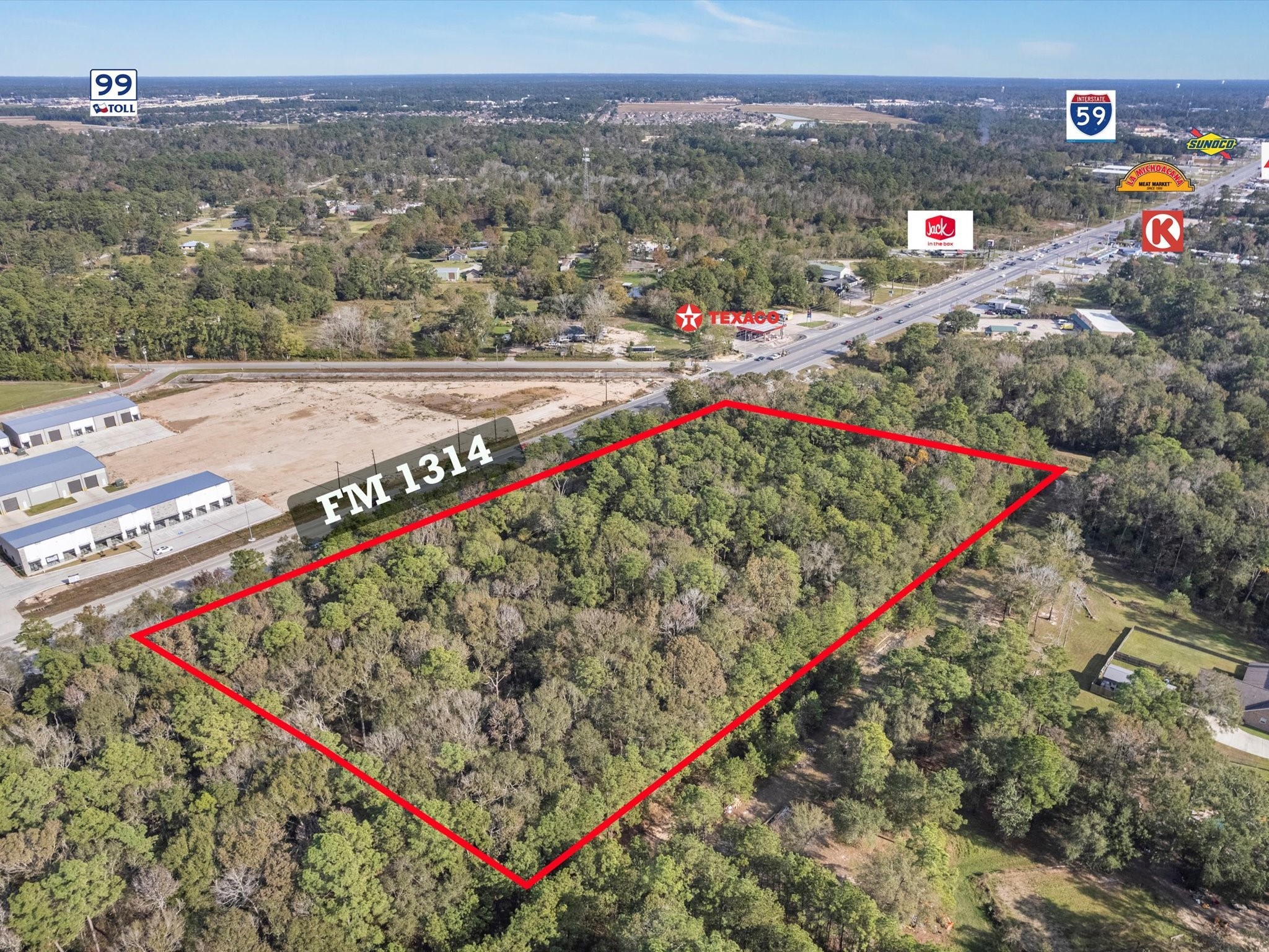 1314 Rd Porter Tx 77365 Road Porter, TX 77365 - Photo 3 of 7 a view of a street with a city view