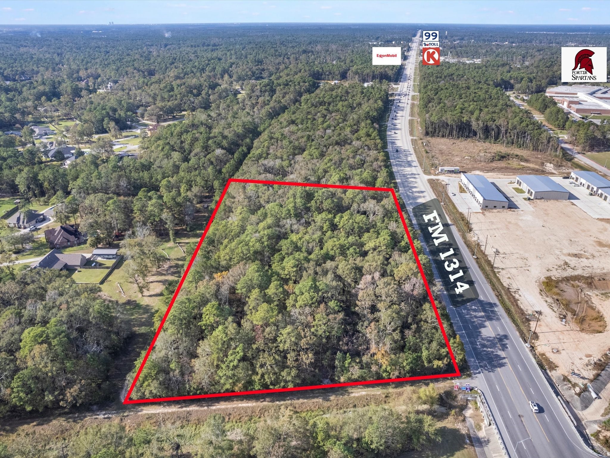 1314 Rd Porter Tx 77365 Road Porter, TX 77365 - Photo 5 of 7 a view of entryway with a flower and trees in the background