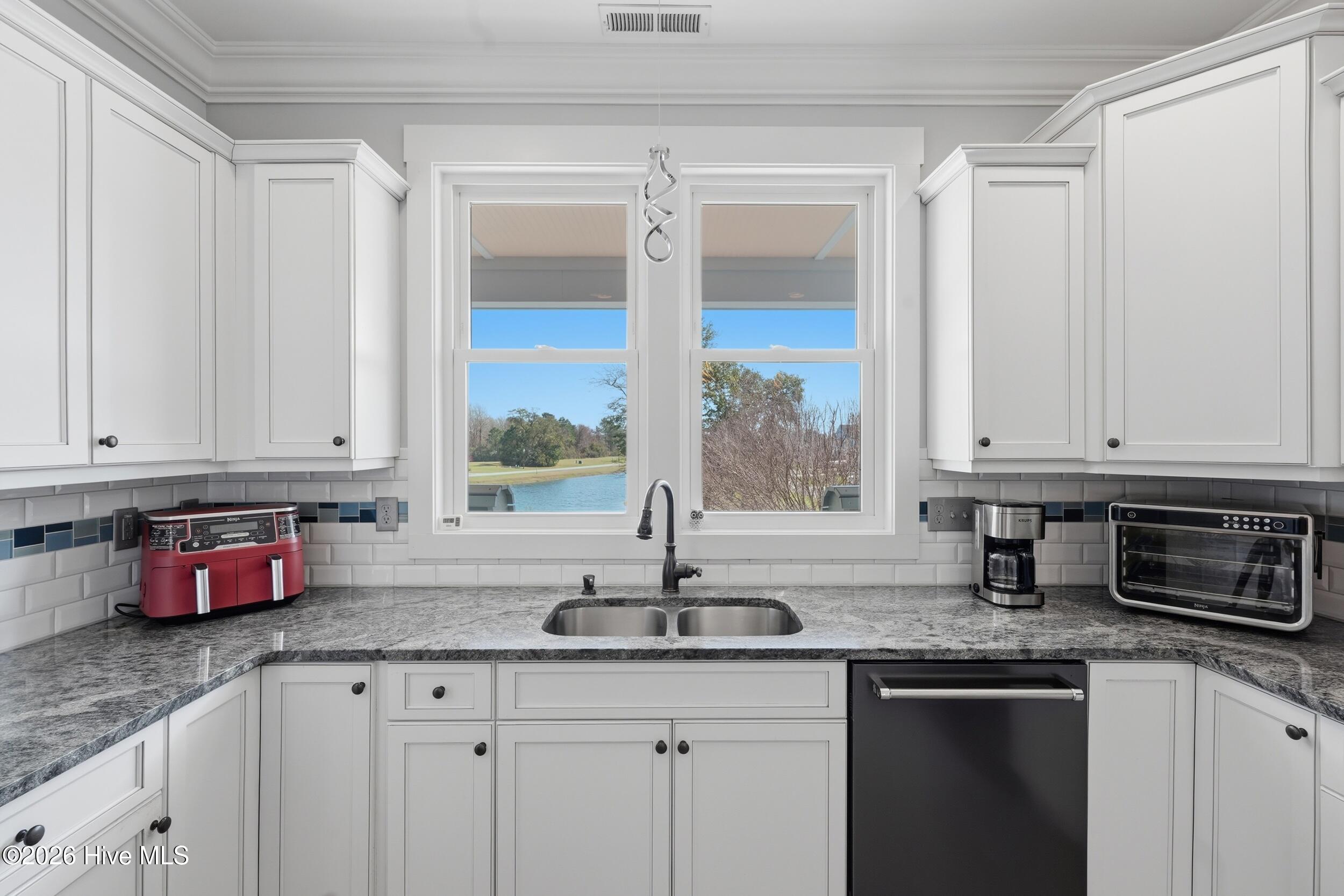 131 Everett Park Trail Holly Ridge, NC 28445 - Photo 29 of 120 Kitchen Sink Window View